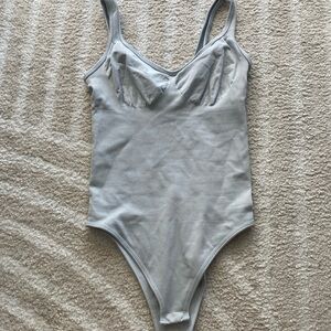 OQQ light blue bodysuit